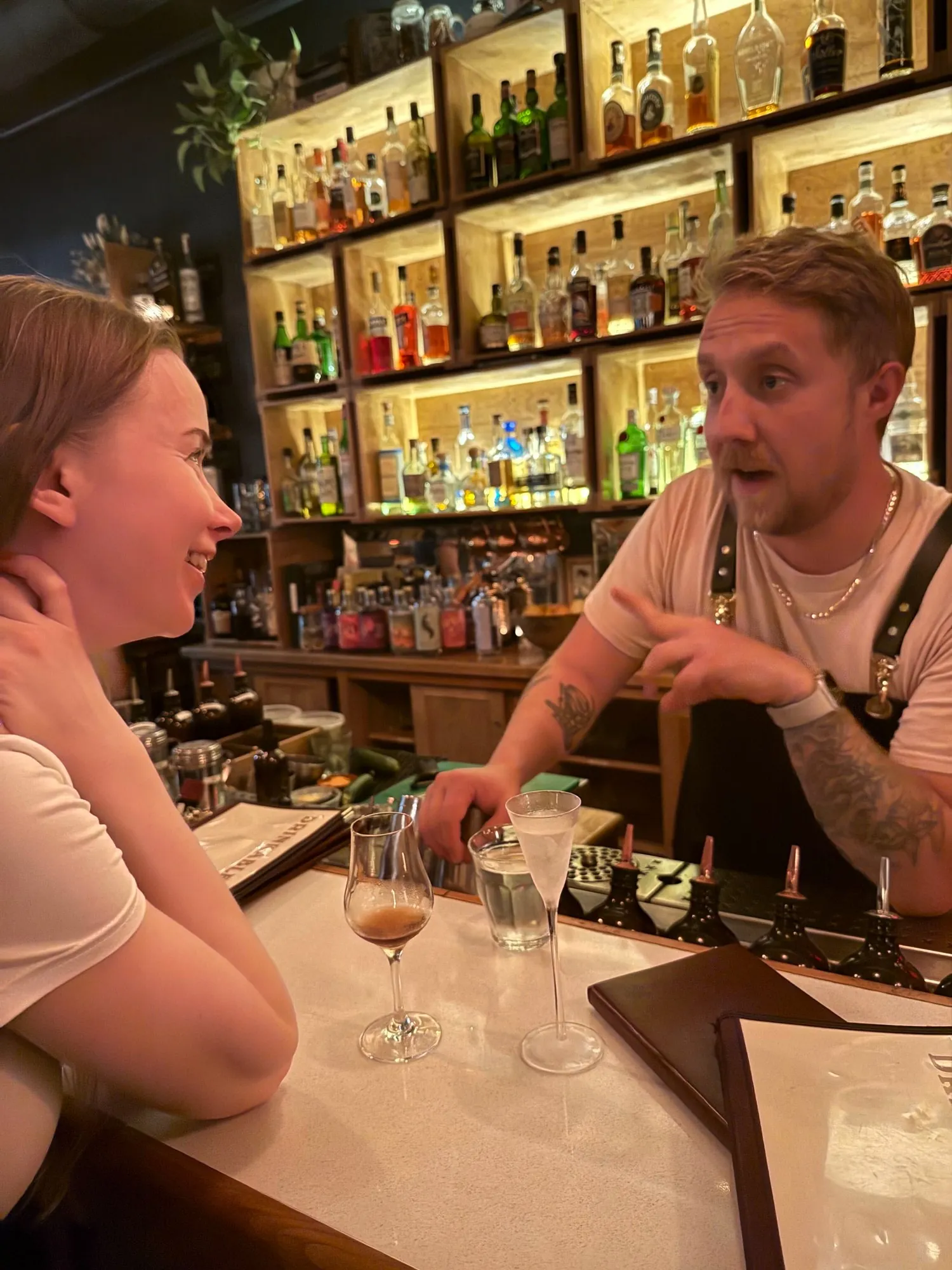 A conversation across the bar, out East